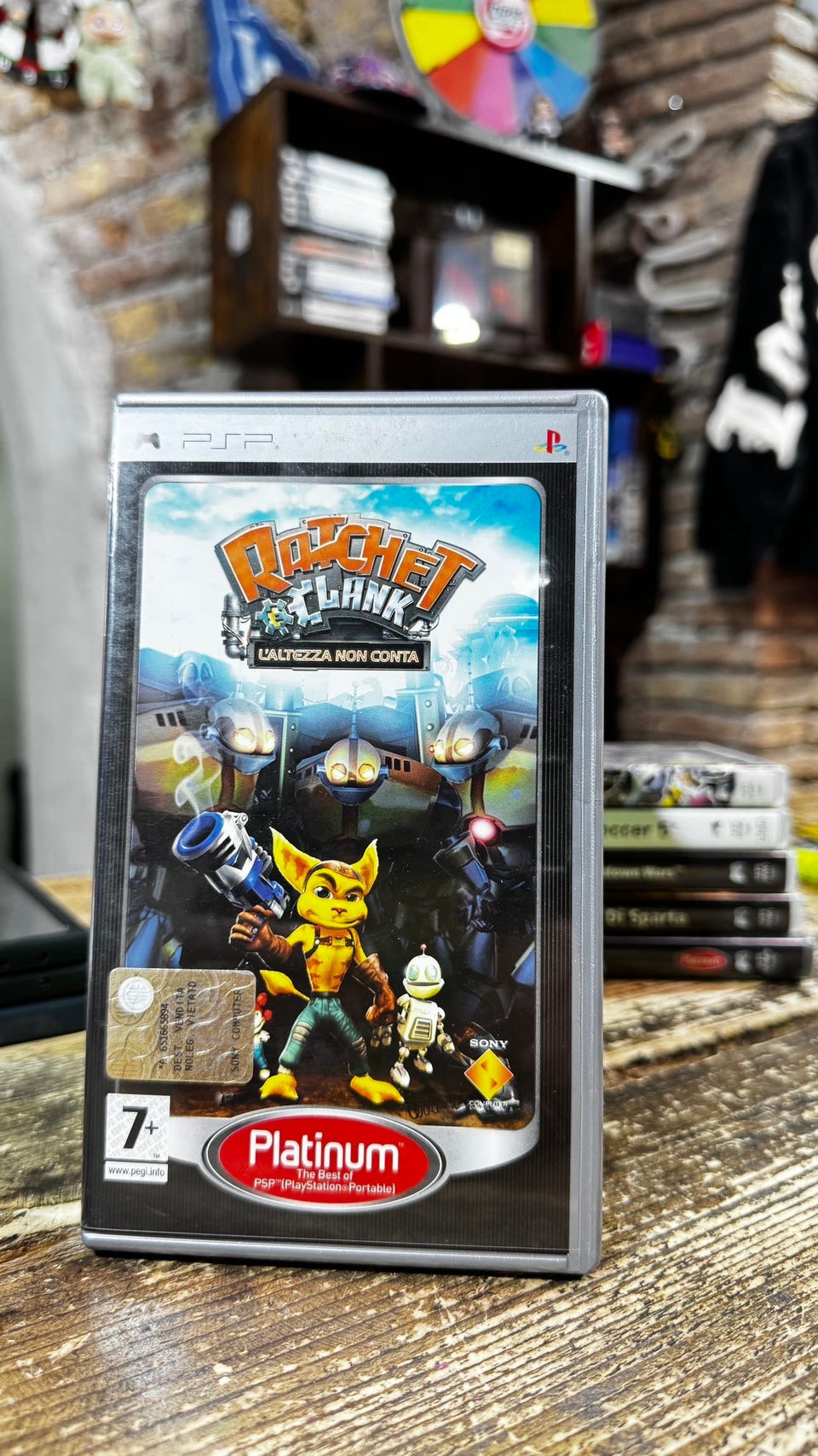 Gioco sony psp ratchet e clank l'altezza non conta