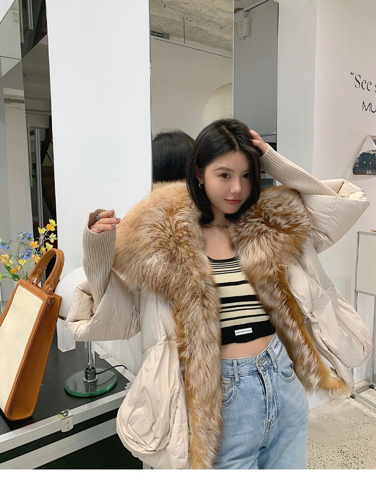 Piumino d'oca con pelliccia di vera volpe